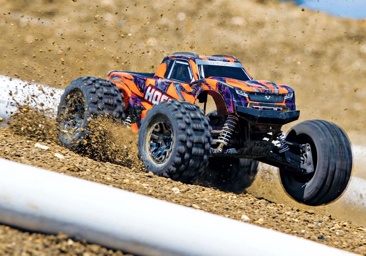 Traxxas Hoss 4X4 VXL 1/10 Scale Monster Truck W/ TQi Traxxas Link Enabled 2.4Ghz Radio System & TSM (Orange) - Image 10